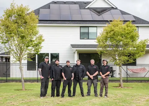 Energy Solutions crew at a home