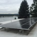 solar panels installed on a commercial building roof