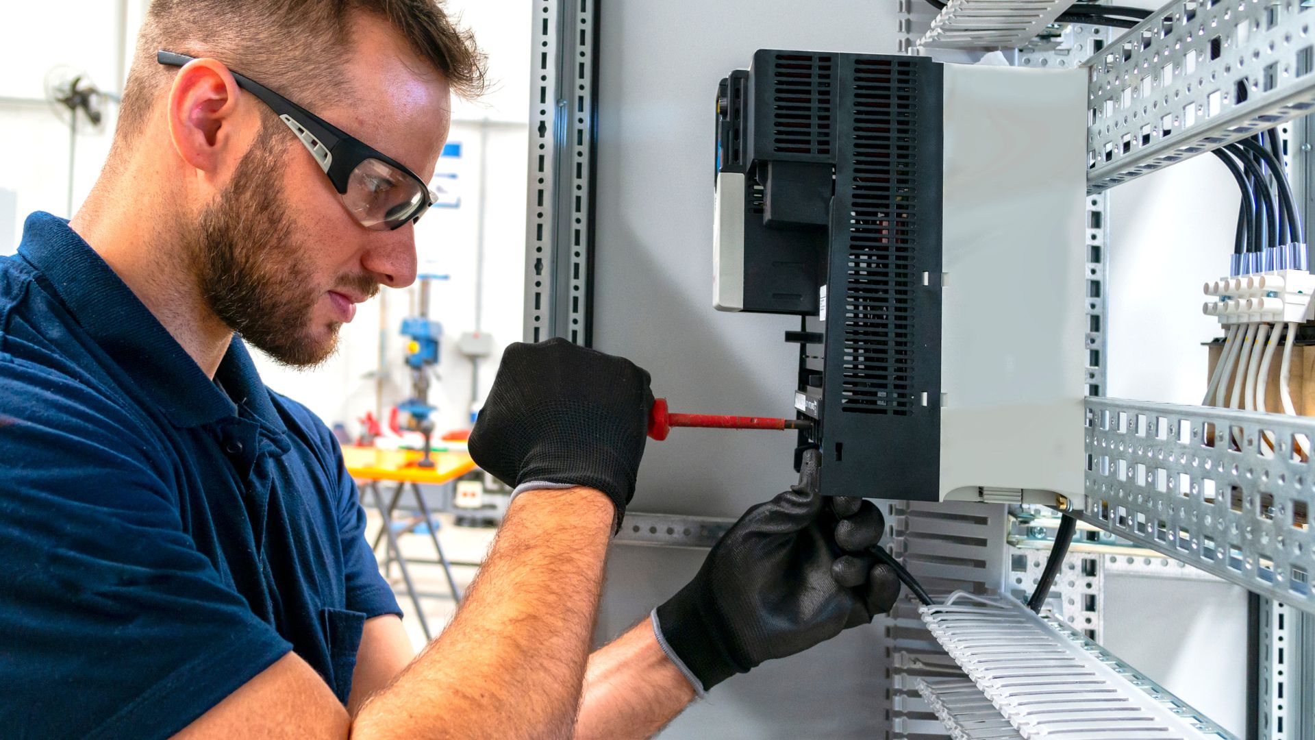 man working to install an electrical panel upgrade