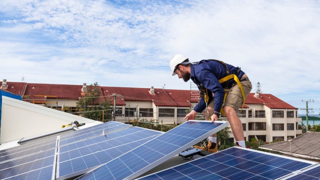 Man installing solar