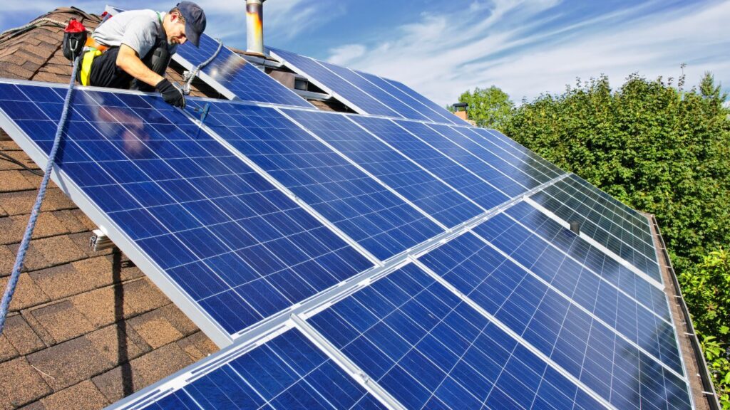 oregon city solar installer working on a roof