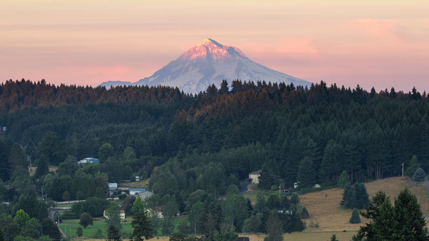 Last evening light on Mount Hood over rural farmland in Clackamas County, Oregon