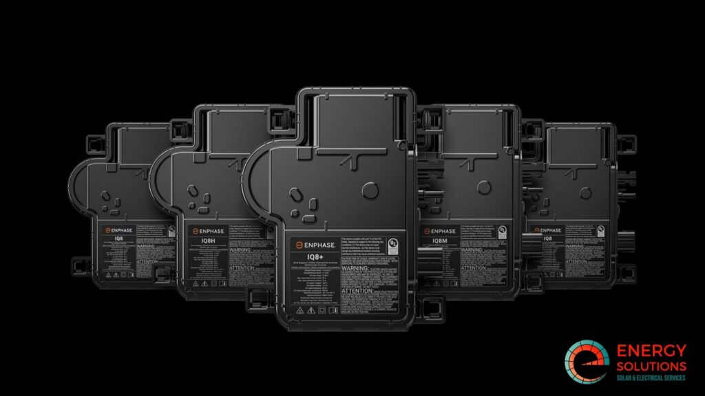 a group of four microinverters on a black background