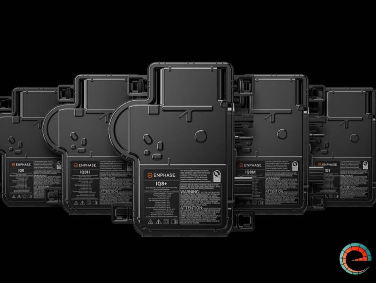 a group of four microinverters on a black background