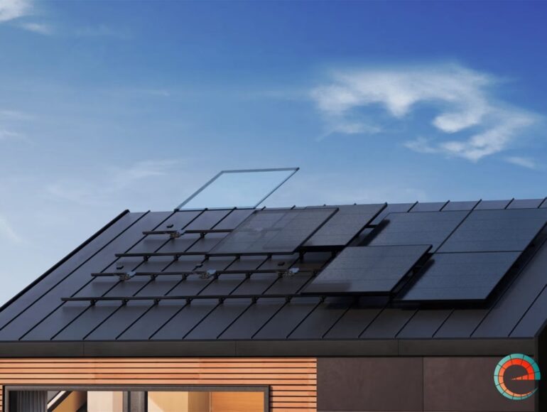 a modern house with solar panels and enphase microinverters on the roof