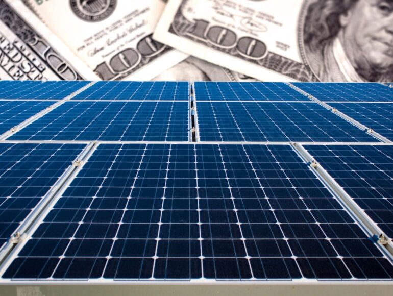 solar panels on a $100 bill background