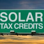 solar tax credits printed on a road sign