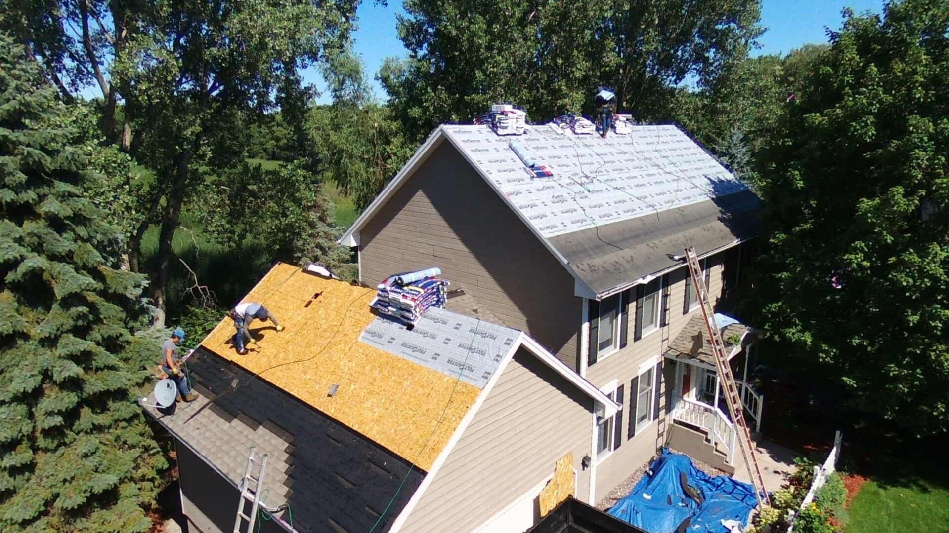 an aerial view of a house with a new roof on it